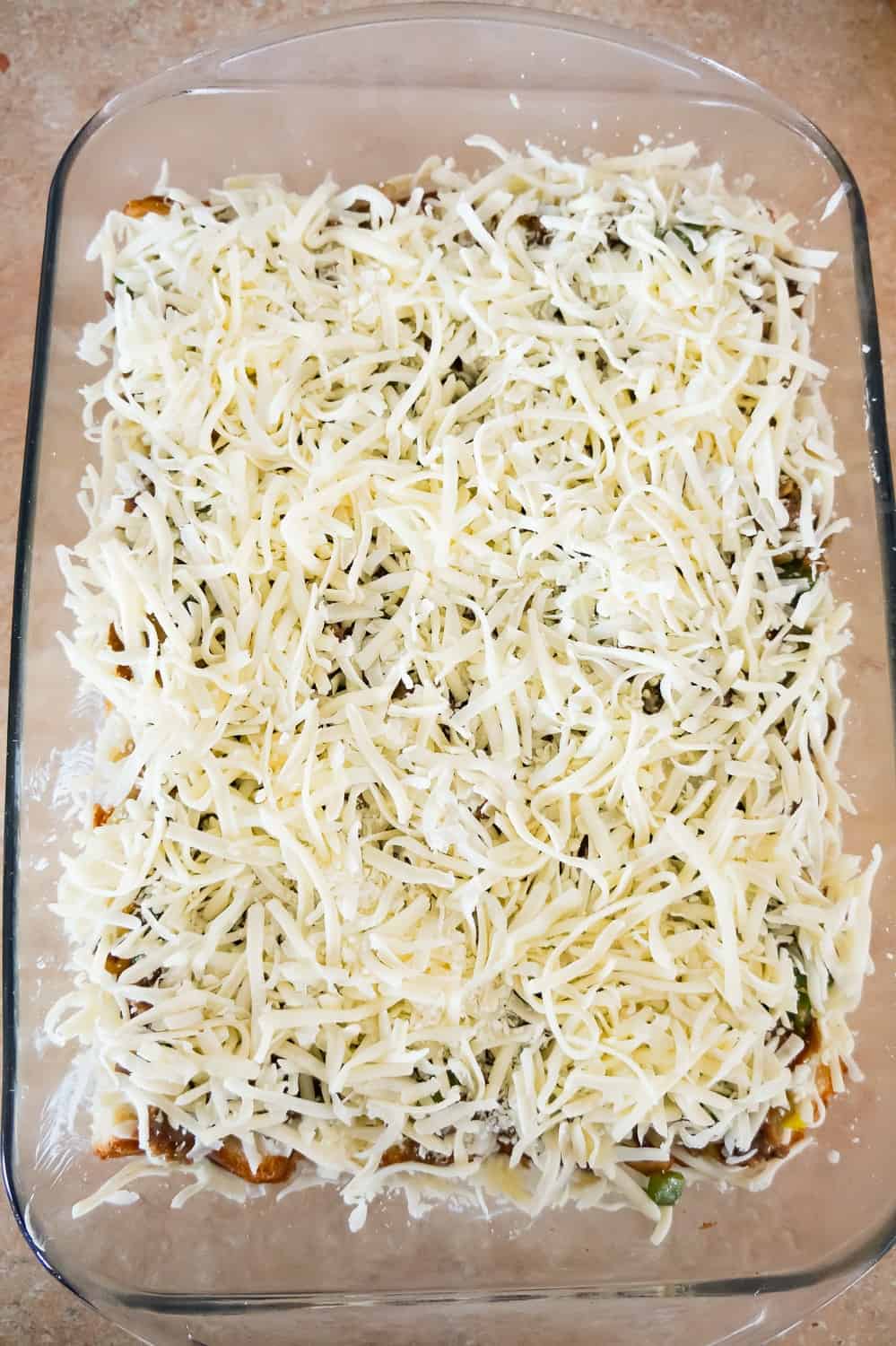 shredded mozzarella cheese on casserole