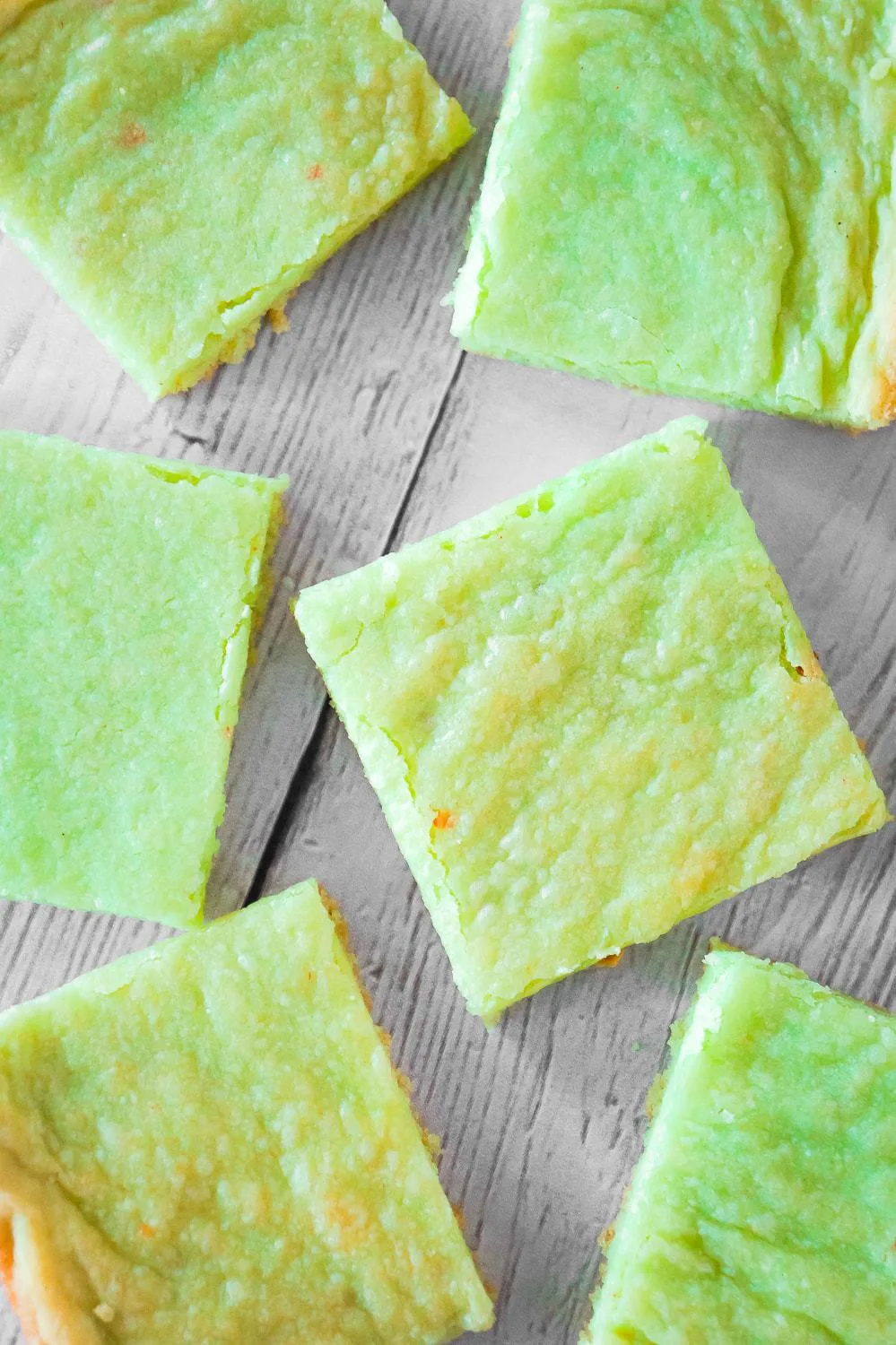 Pistachio Pudding Sugar Cookie Bars are soft, chewy and delicious. This super easy cookie bar recipe uses pistachio instant pudding mix and Betty Crocker sugar cookie mix.