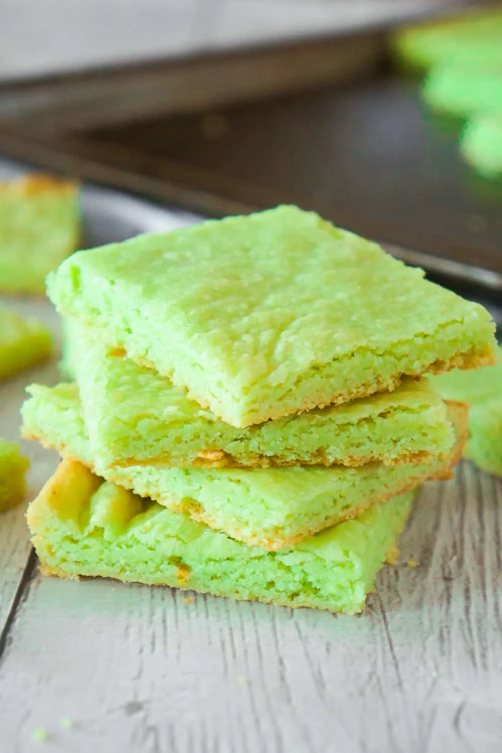 Pistachio Pudding Sugar Cookie Bars are soft, chewy and delicious. This super easy cookie bar recipe uses pistachio instant pudding mix and Betty Crocker sugar cookie mix.