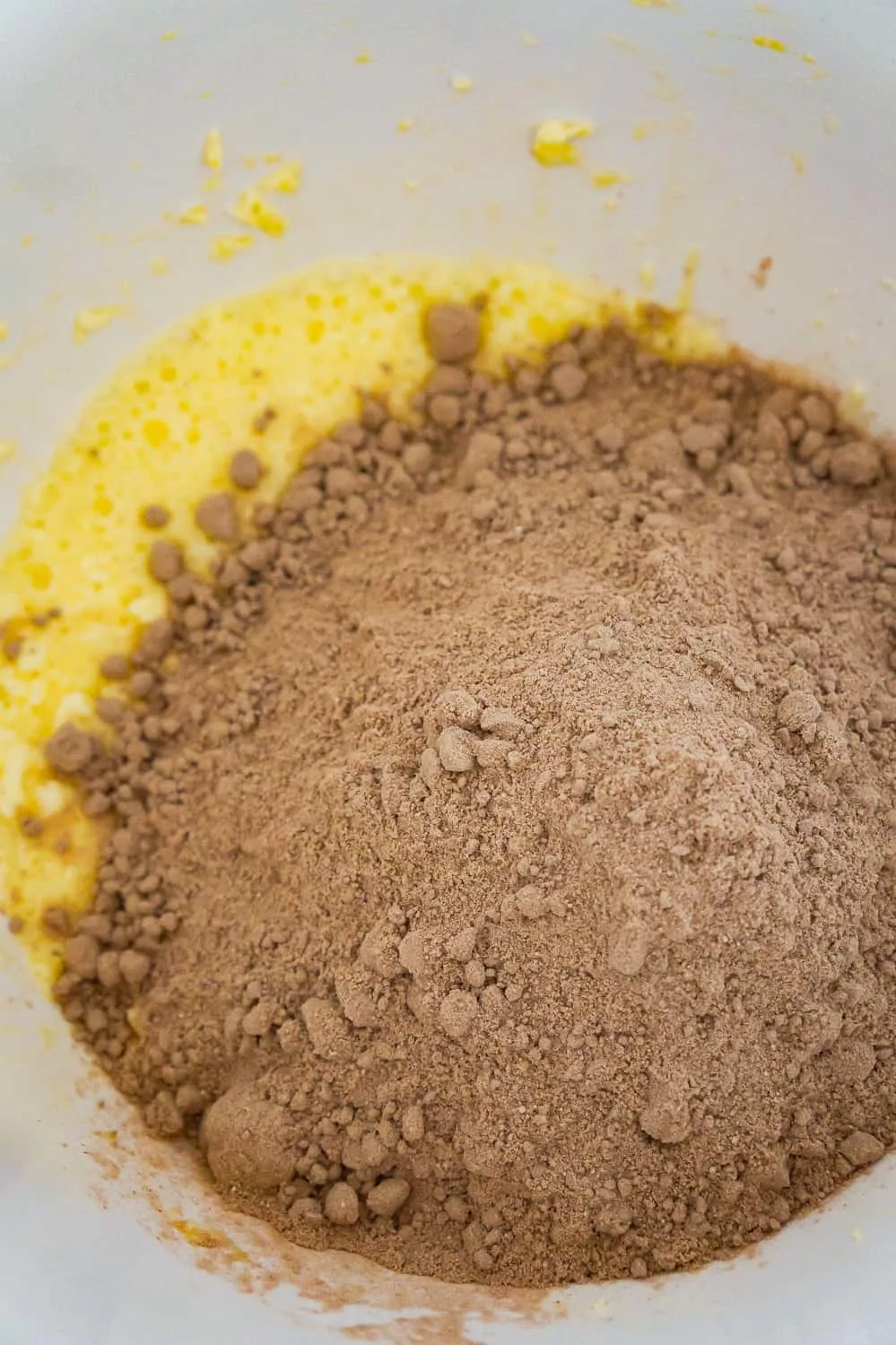 red velvet cake mix added to butter and egg mixture