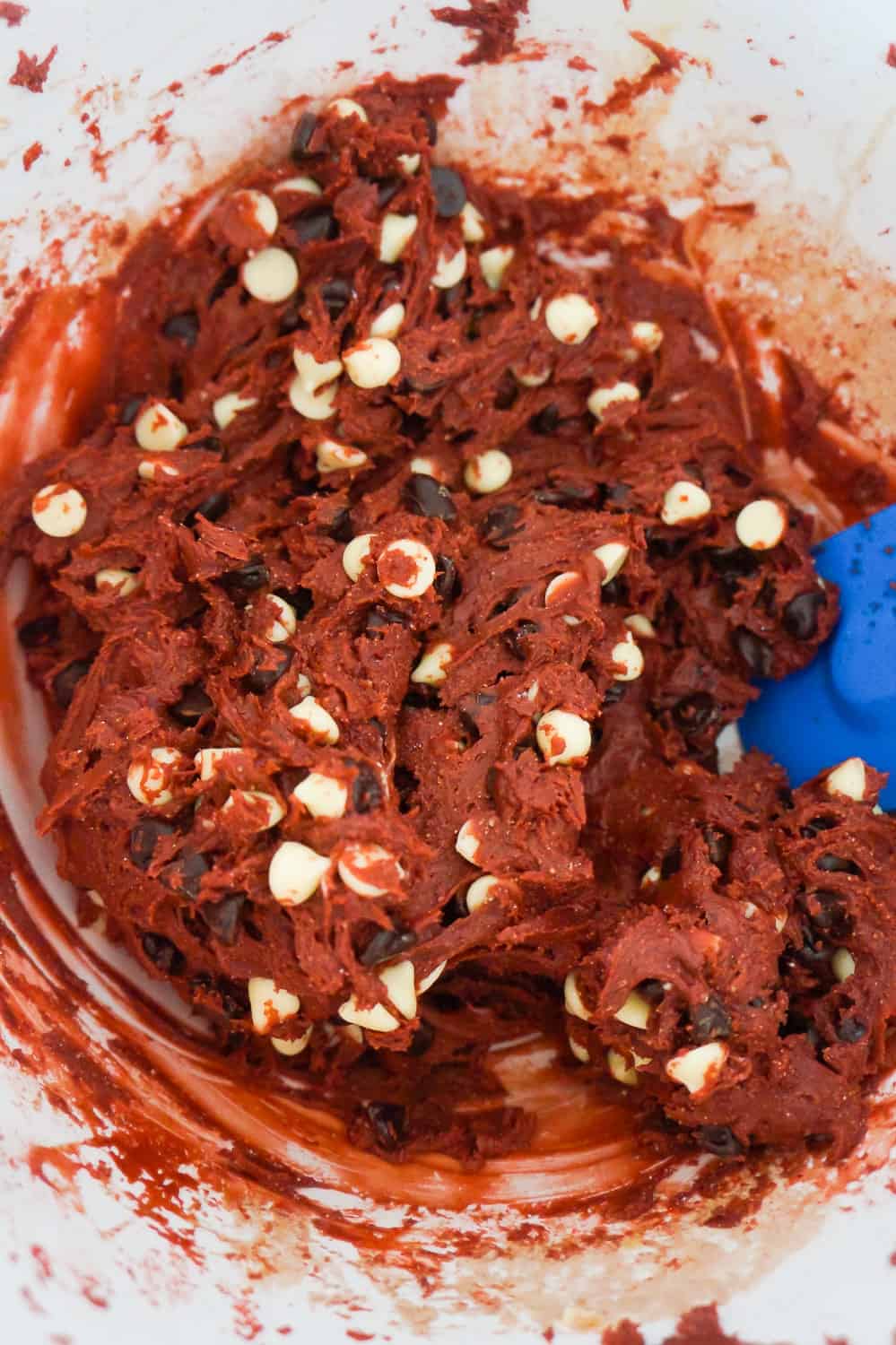 red velvet cookie dough in a mixing bowl