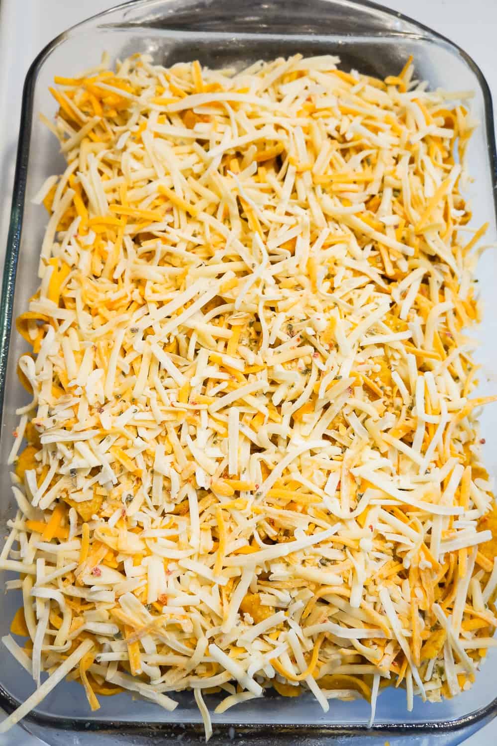 shredded cheese blend on top of frito pie