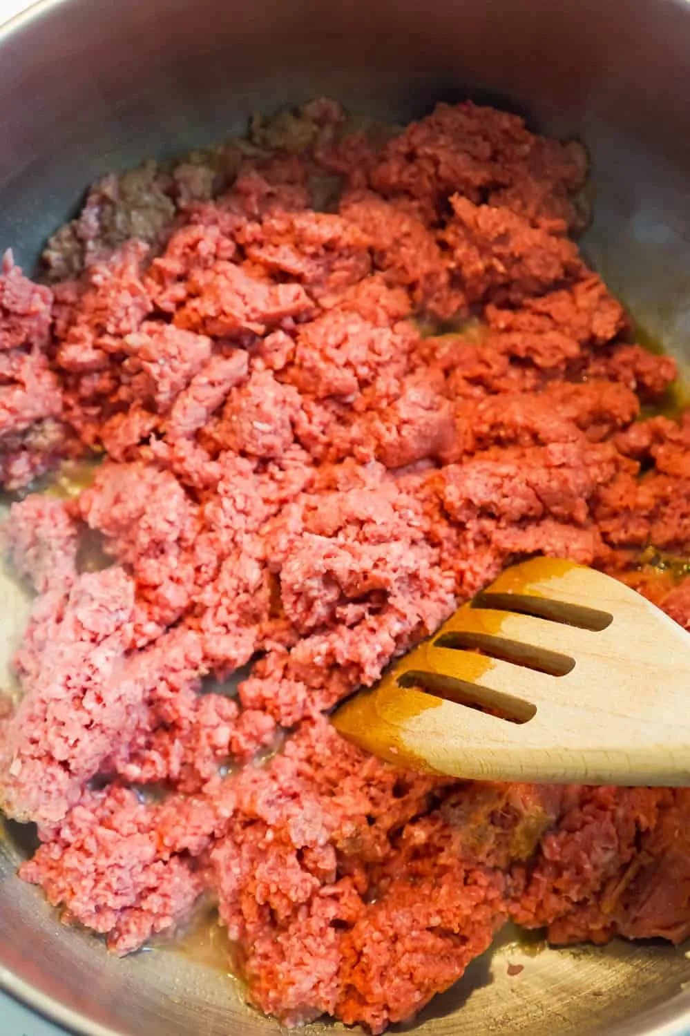 raw ground beef in a pan
