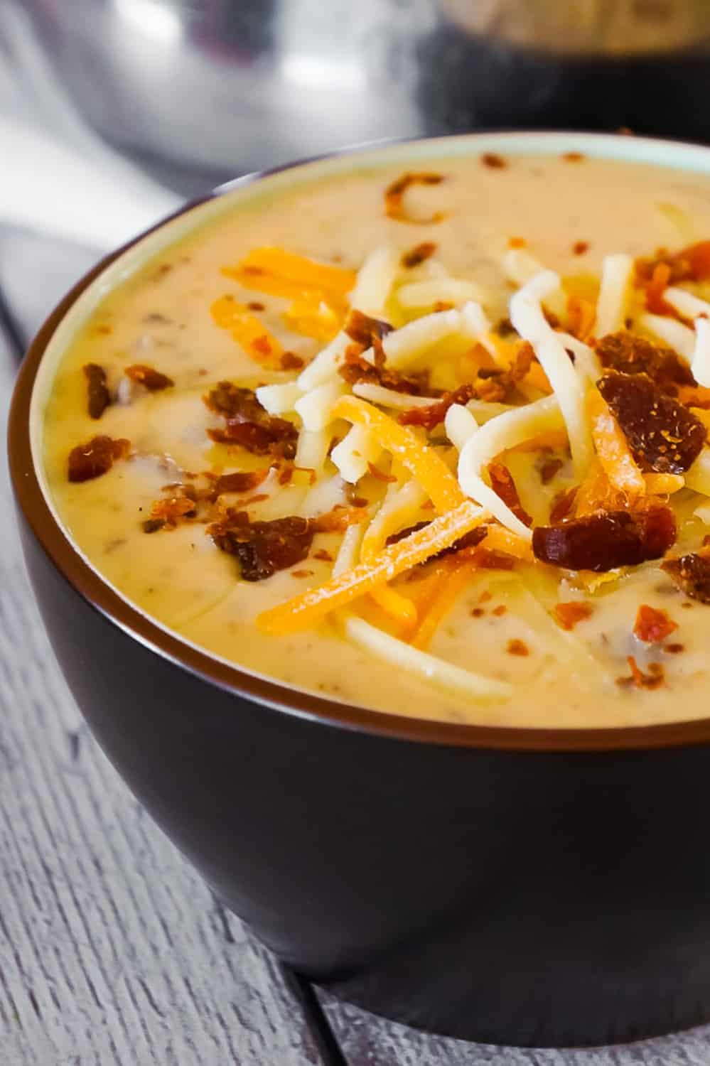 Bacon Cheeseburger Soup is a hearty soup recipe that can be whipped up in just fifteen minutes. This tasty dish made with Campbell's Cream of Bacon soup and Campbell's Cheddar Cheese soup, is loaded with ground beef, real bacon bits and cheddar cheese.