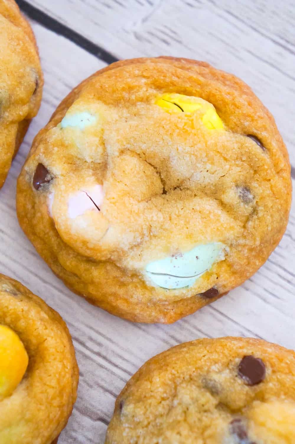 Easter Cookies are delicious chocolate chip cookies loaded with milk chocolate and cookies and cream Hershey's Eggies. These chewy chocolate chip cookies with mini eggs are made with butter flavoured Crisco.