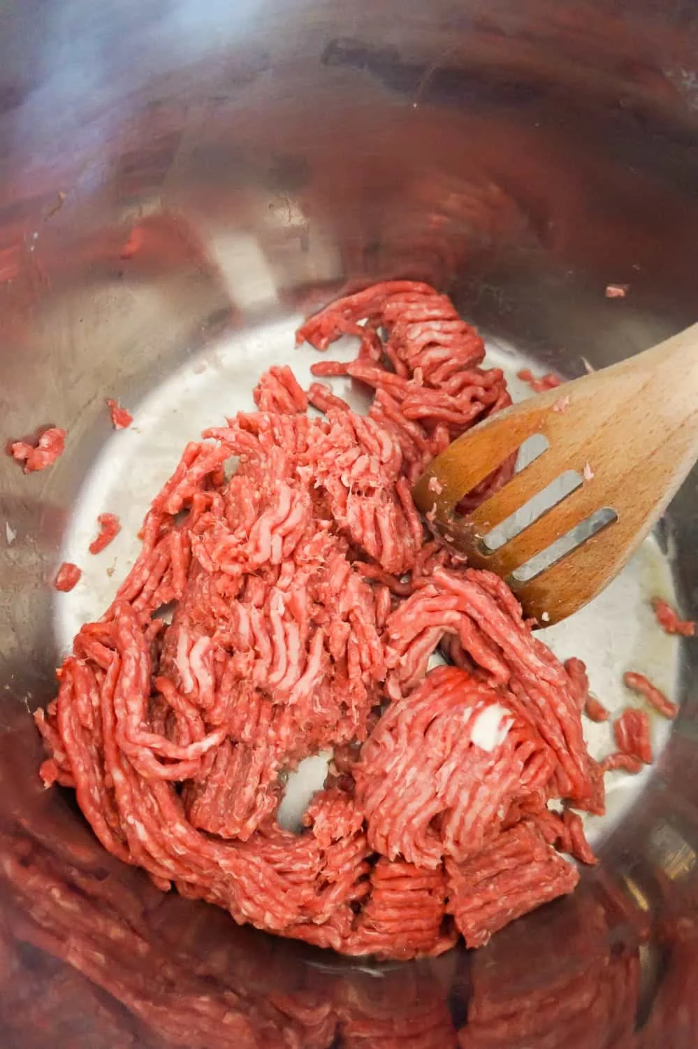 uncooked ground beef in an Instant Pot