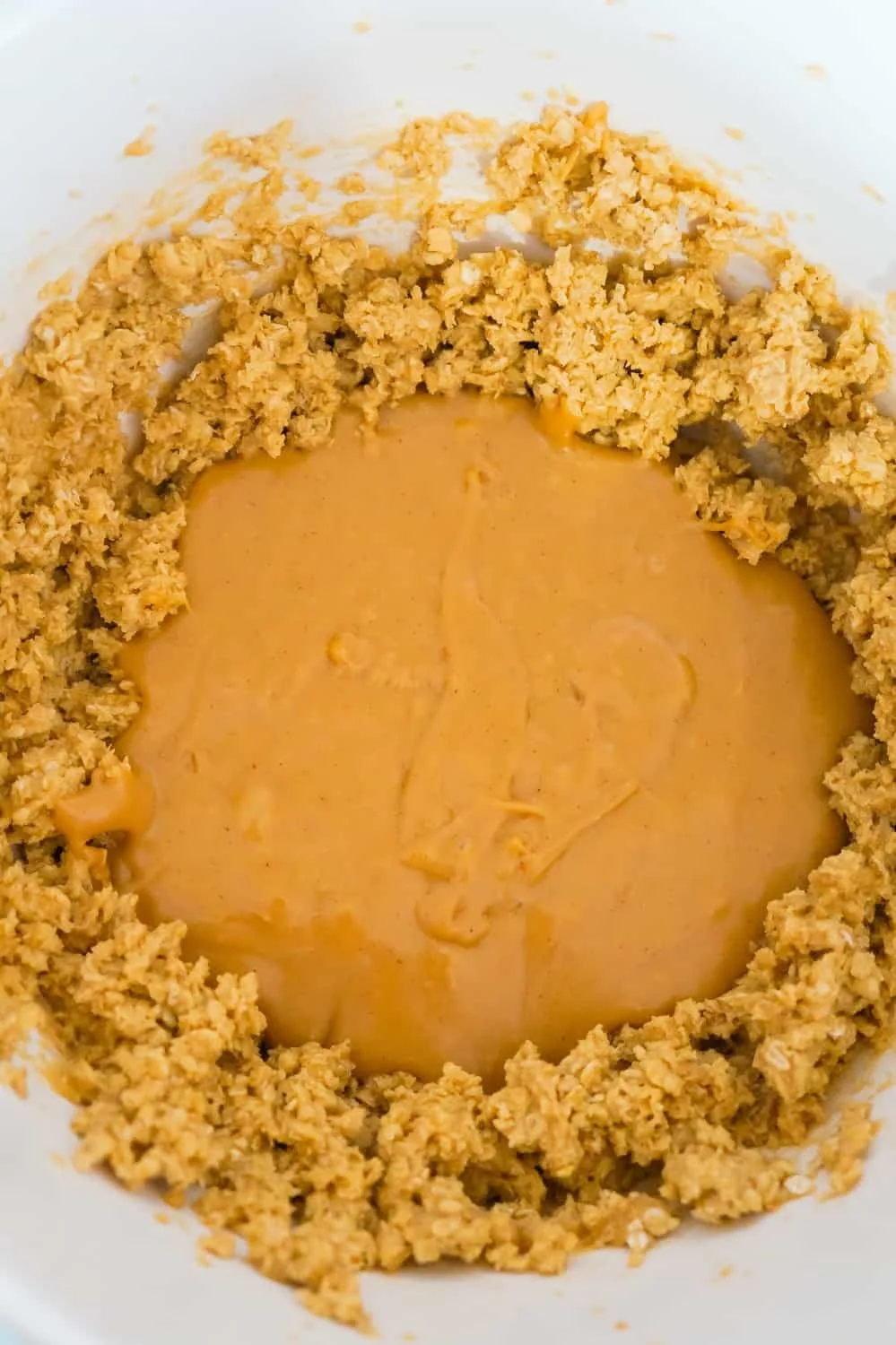 melted peanut butter baking chips added to monster cookie dough
