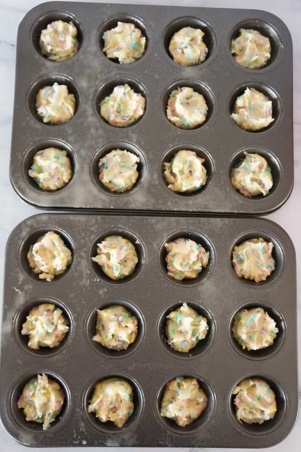 sugar cookie dough in mini muffin tins