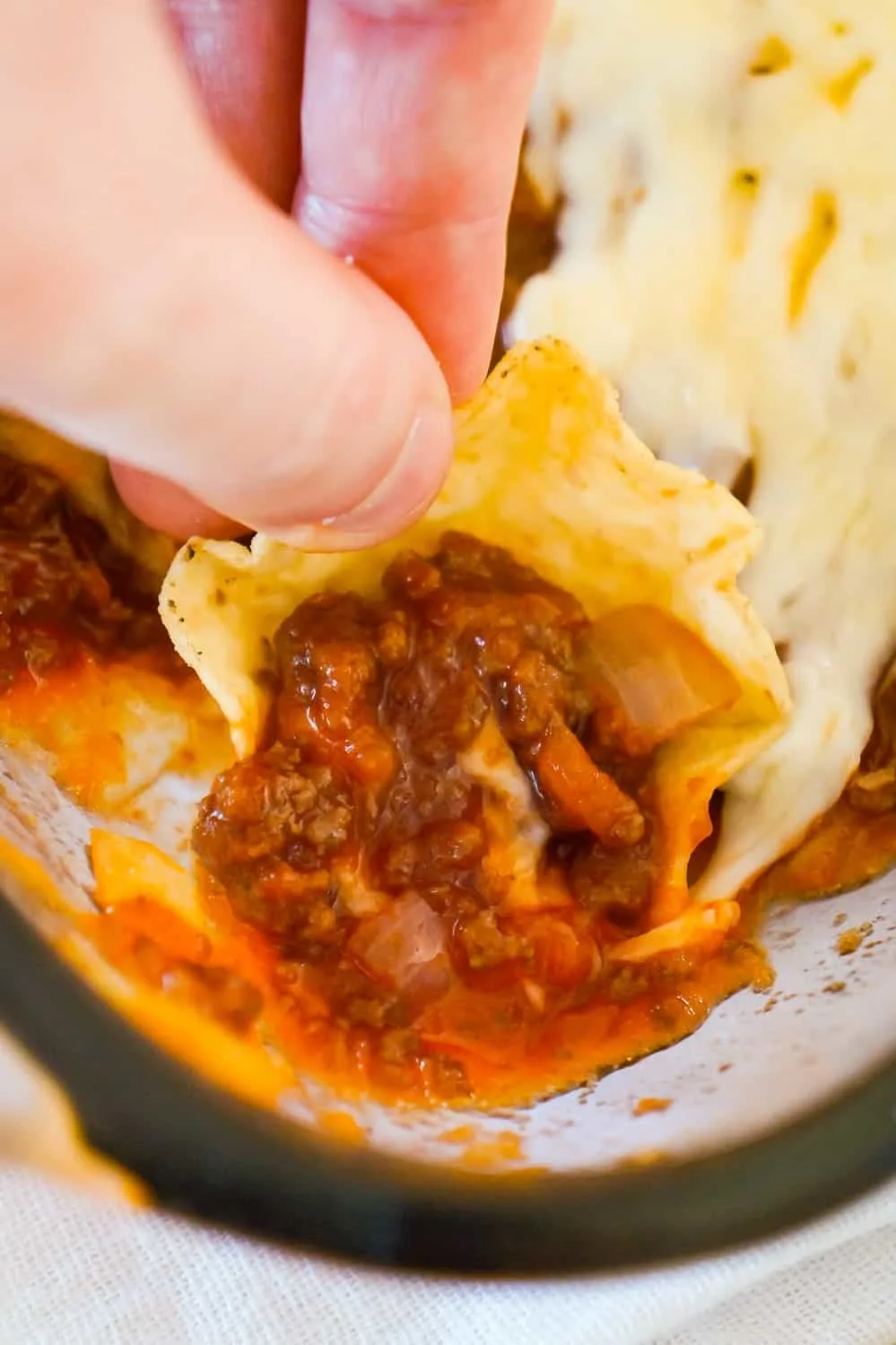 Sloppy Joe Dip is a delicious party dip recipe loaded with ground beef and dripping with melted cheese. This dip, with all the flavours of the classic sloppy joe, is perfect for dipping chips and crackers.