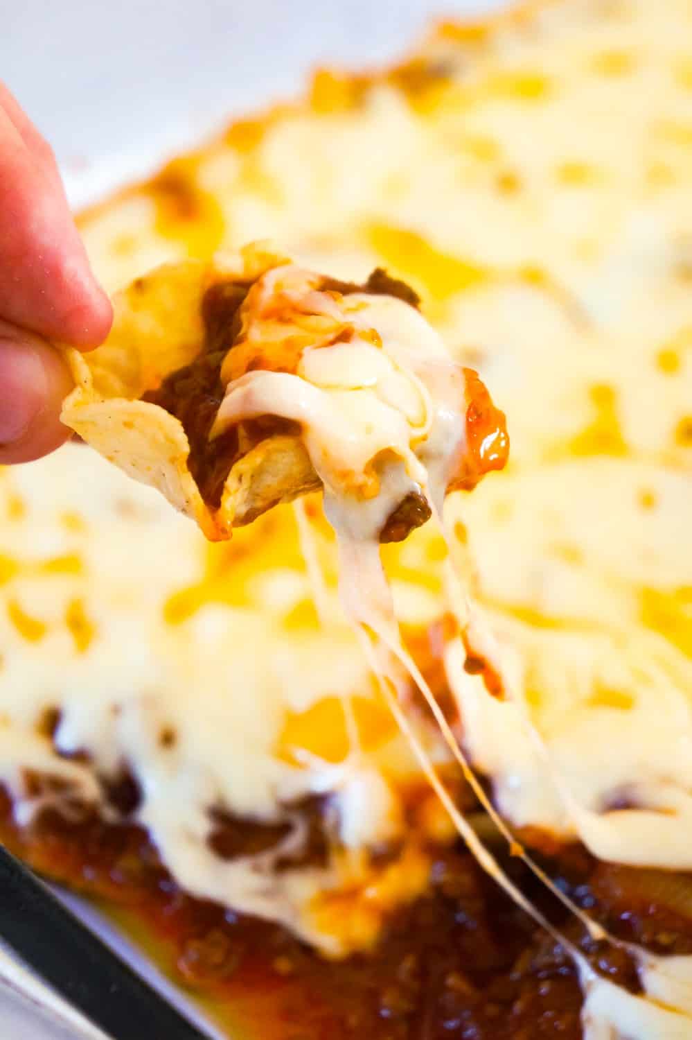 Sloppy Joe Dip is a delicious party dip recipe loaded with ground beef and dripping with melted cheese. This dip, with all the flavours of the classic sloppy joe, is perfect for dipping chips and crackers.