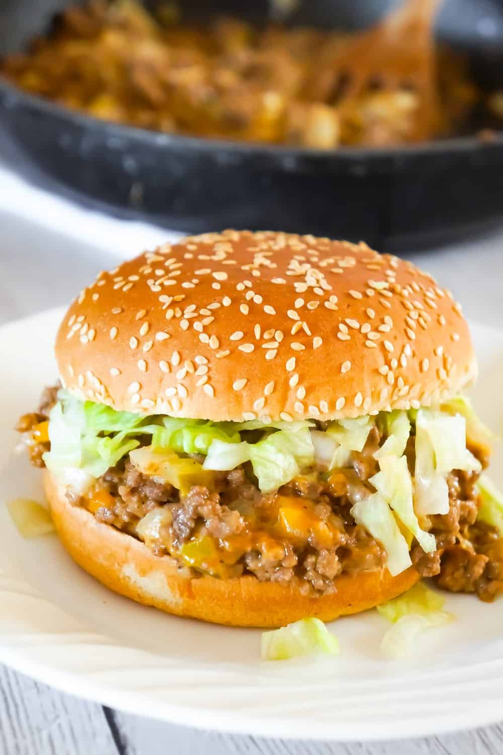 Big Mac Sloppy Joes are an easy ground beef dinner recipe perfect for weeknights. These sloppy joes are loaded with onions, pickles and cheddar cheese all tossed in a copycat Big Mac Sauce.