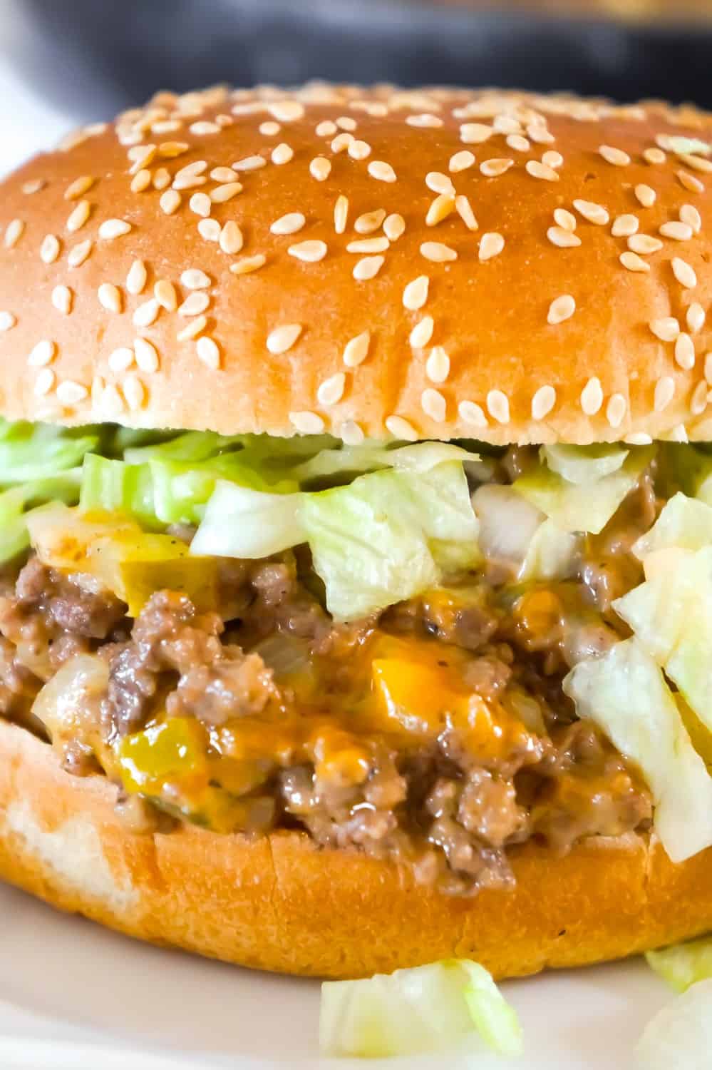 Big Mac Sloppy Joes are an easy ground beef dinner recipe perfect for weeknights. These sloppy joes are loaded with onions, pickles and cheddar cheese all tossed in a copycat Big Mac Sauce.