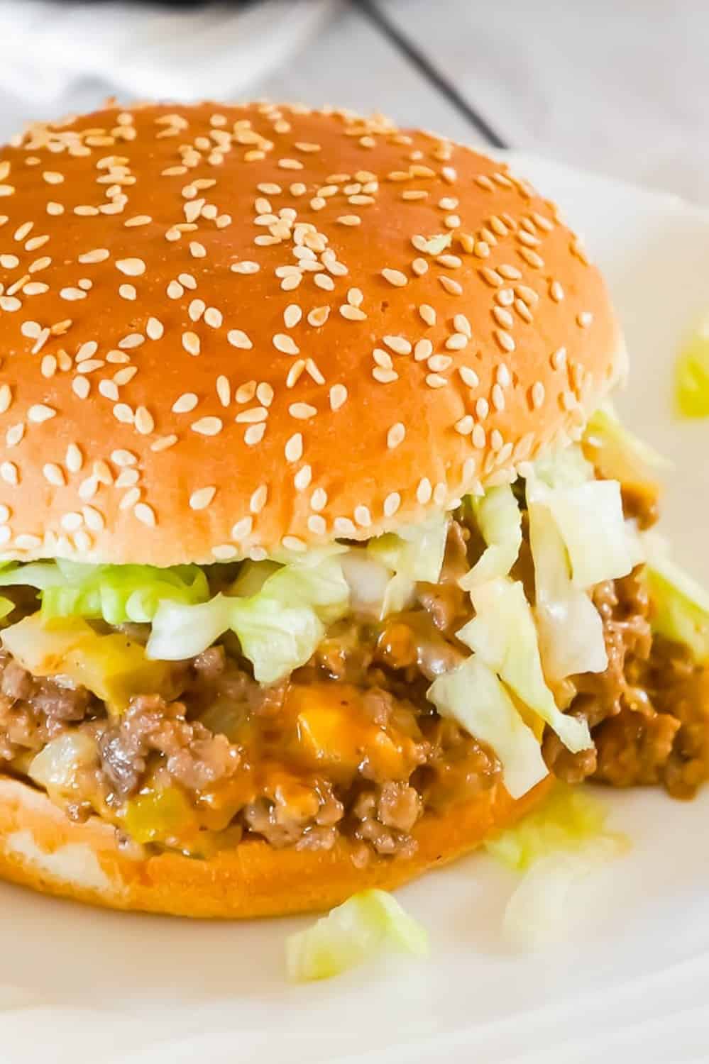 Big Mac Sloppy Joes are an easy ground beef dinner recipe perfect for weeknights. These sloppy joes are loaded with onions, pickles and cheddar cheese all tossed in a copycat Big Mac Sauce.