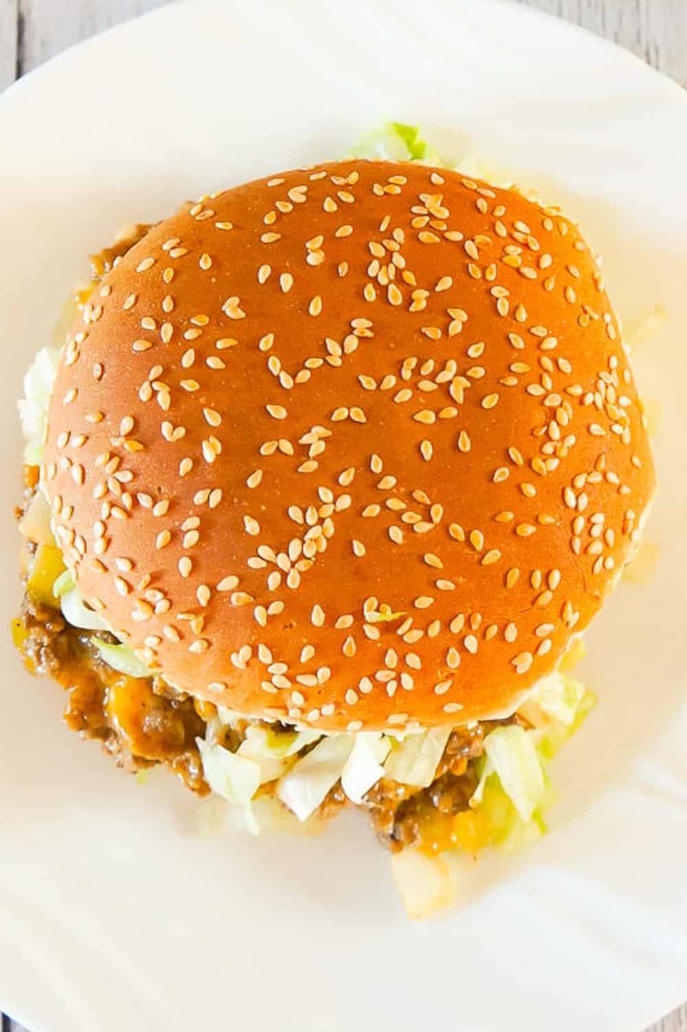 Big Mac Sloppy Joes are an easy ground beef dinner recipe perfect for weeknights. These sloppy joes are loaded with onions, pickles and cheddar cheese all tossed in a copycat Big Mac Sauce.