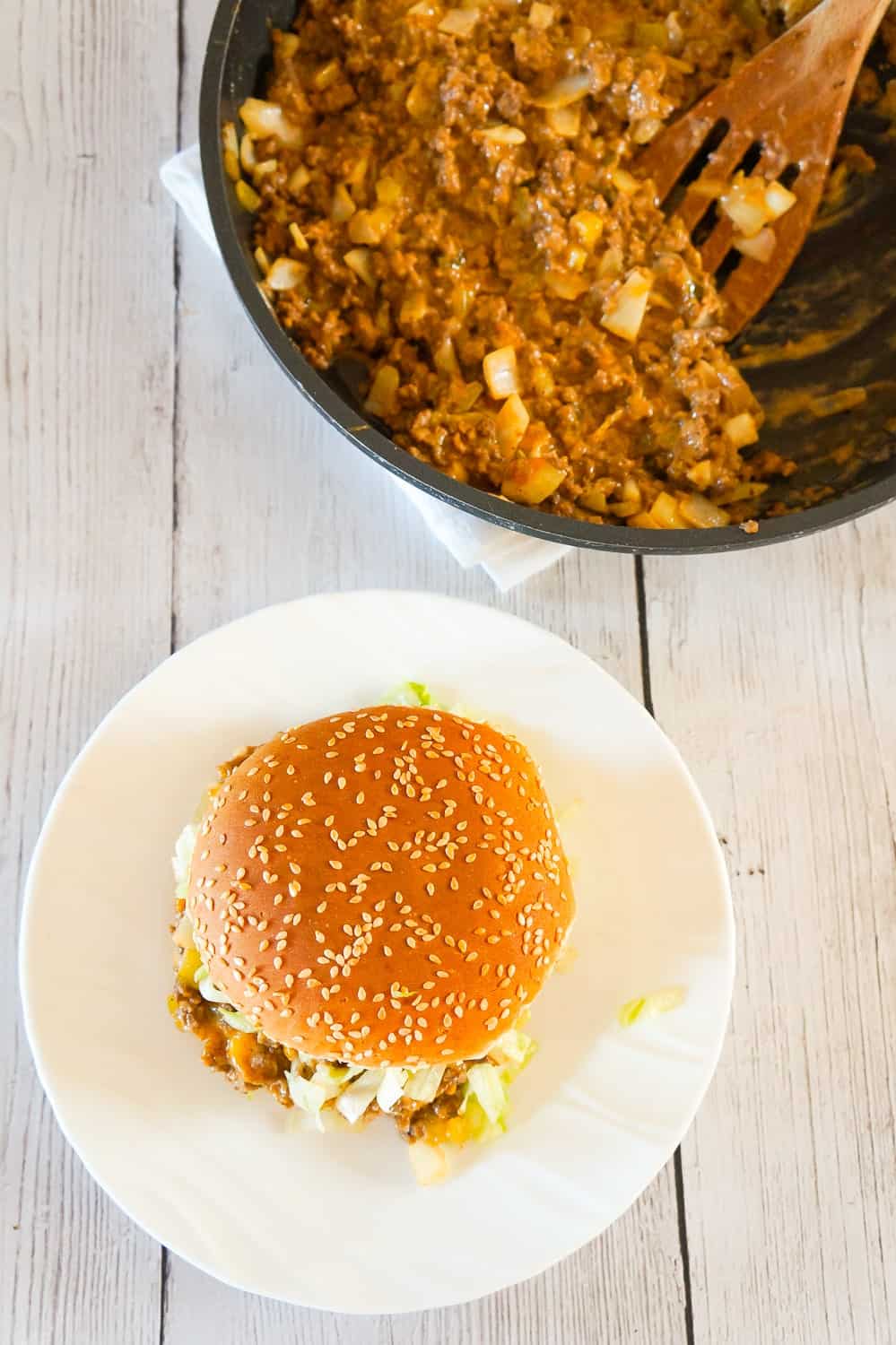 Big Mac Sloppy Joes are an easy ground beef dinner recipe perfect for weeknights. These sloppy joes are loaded with onions, pickles and cheddar cheese all tossed in a copycat Big Mac Sauce.