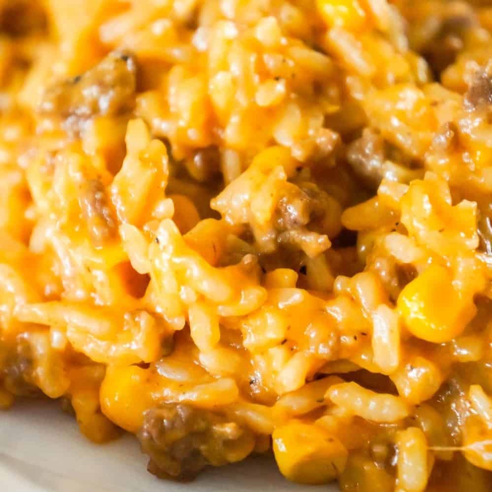 Instant Pot Cheesy Ground Beef and Rice is an easy dinner recipe perfect for weeknights. This Instant Pot rice dish is loaded with ground beef, corn, mozzarella and cheddar cheese.