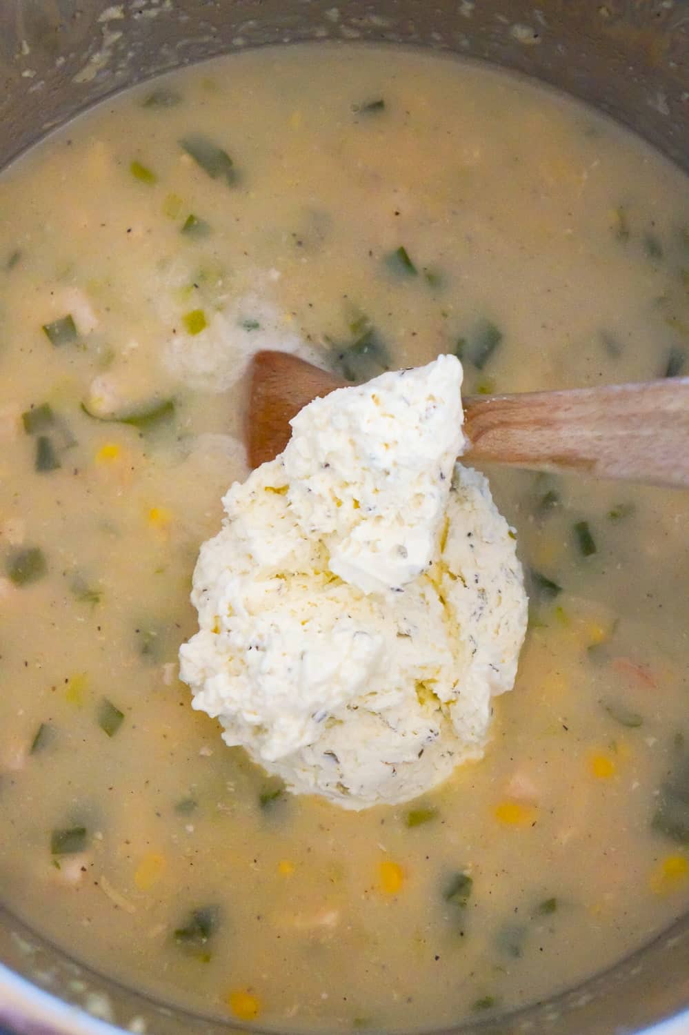 Philadelphia Whipped Chive cream cheese added to pot with chicken gnocchi soup