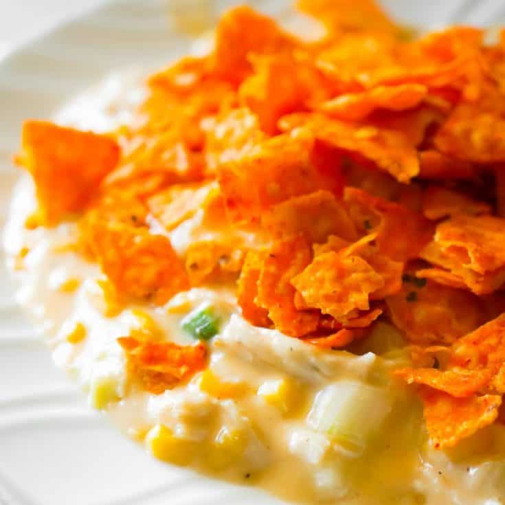 Instant Pot Doritos Chicken Casserole is an easy chicken dinner recipe the whole family will love. This creamy chicken casserole is loaded with corn, green onions, cream cheese, mozzarella and cheddar cheese.