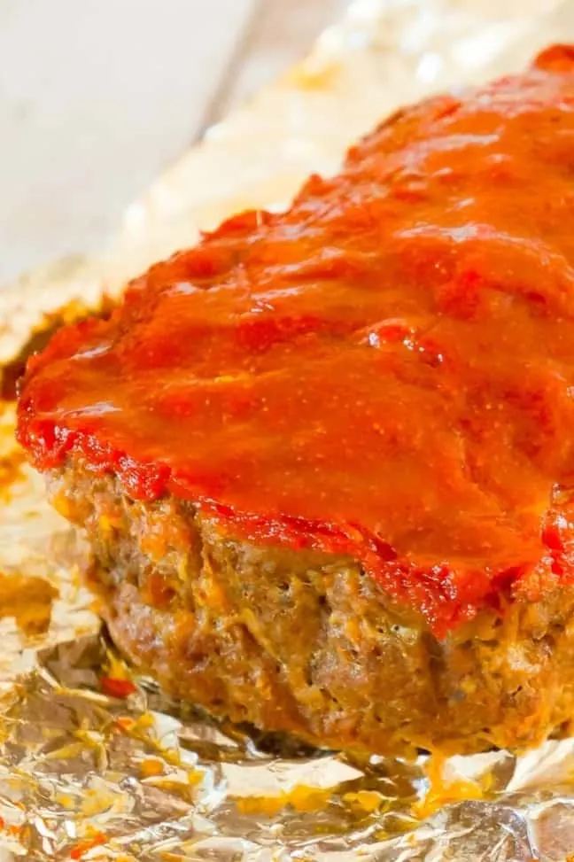 Meatloaf with Stuffing is a tasty 2 pound ground beef meatloaf made with Stove Top stuffing mix.