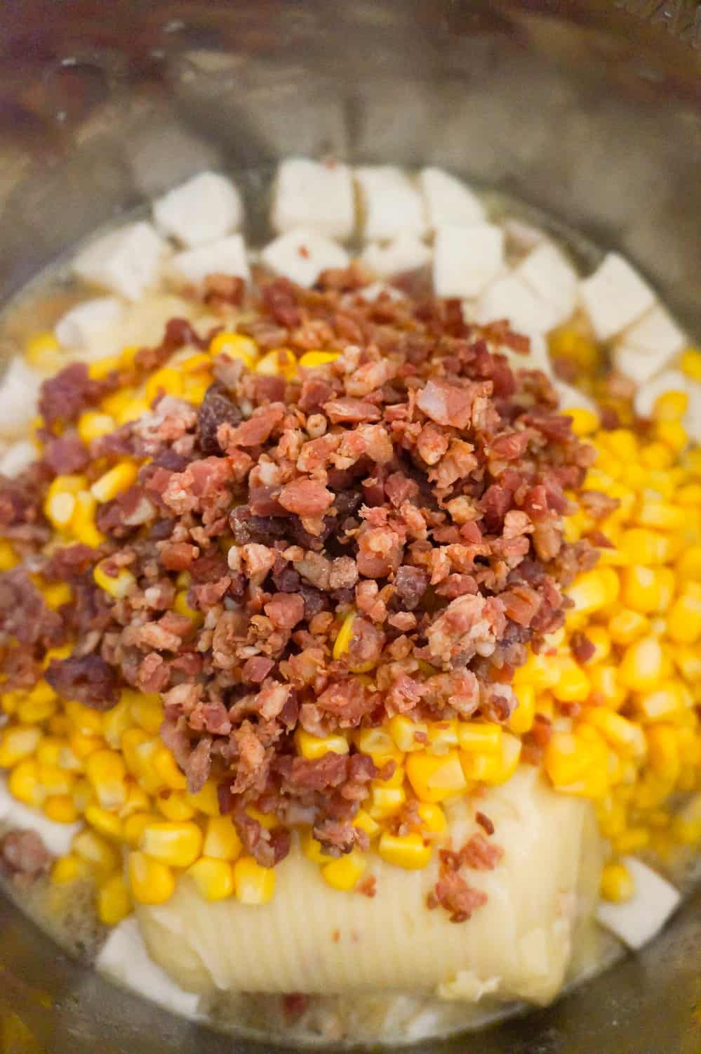 real bacon bits, sweet corn and Pillsbury biscuit dough pieces in an Instant Pot
