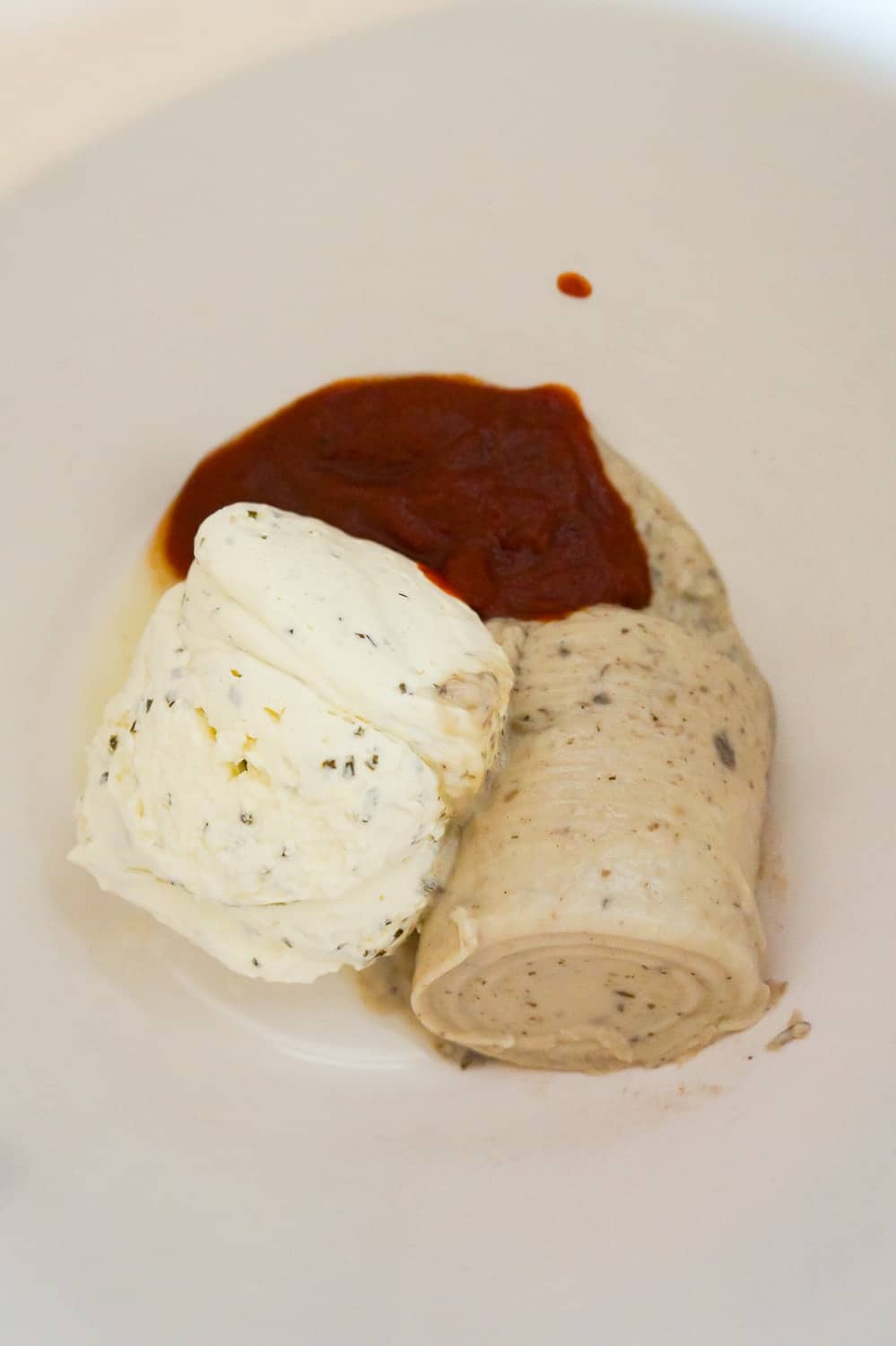 cream cheese, cream of mushroom soup and Heinz chili sauce in a mixing bowl