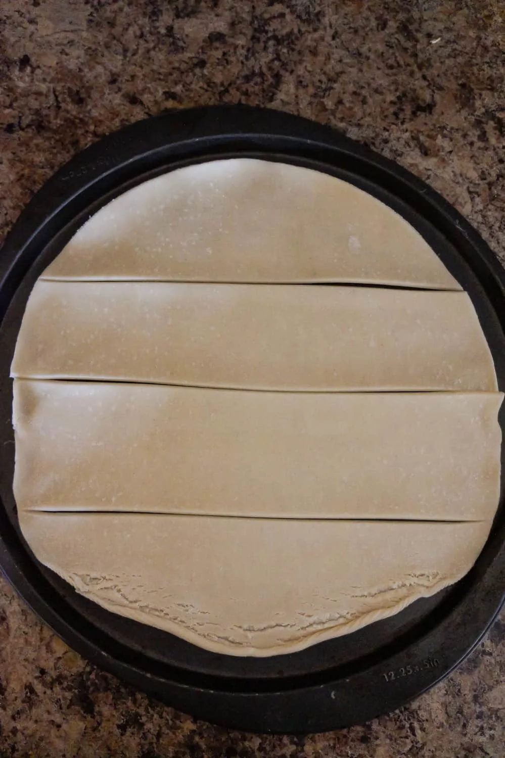 Pillsbury pie crust dough cut into four wide strips