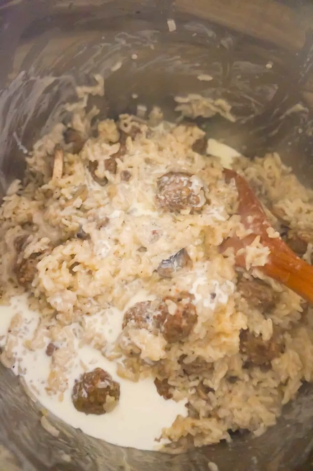 heavy cream, meatballs and rice after cooking in an Instant Pot