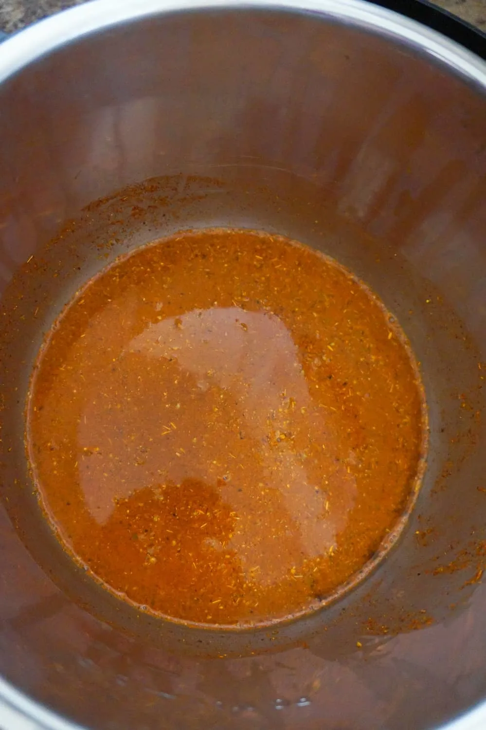 water and taco seasoning in an Instant Pot