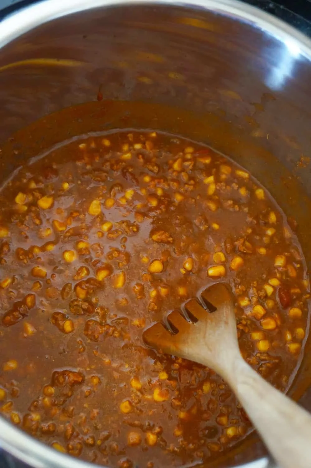 ground beef and corn chili mixture in an Instant Pot