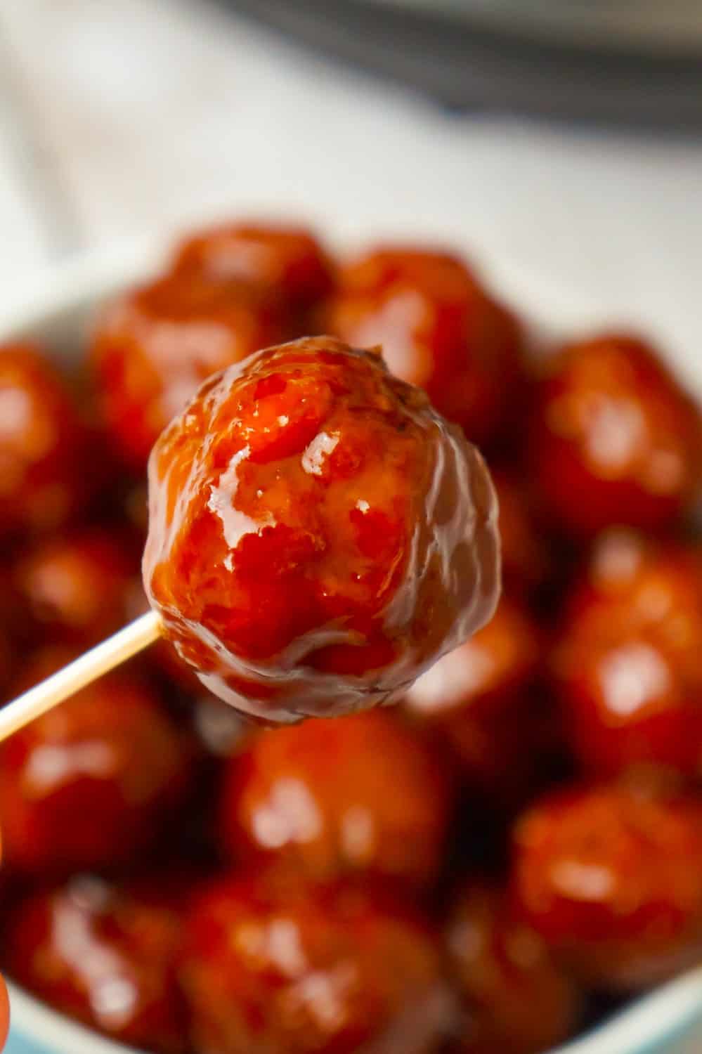 Instant Pot Grape Jelly Meatballs are the perfect party food. These tasty meatballs are coated in Welsh's Grape Jelly and Sweet Baby Ray's Hickory and Brown Sugar BBQ Sauce.