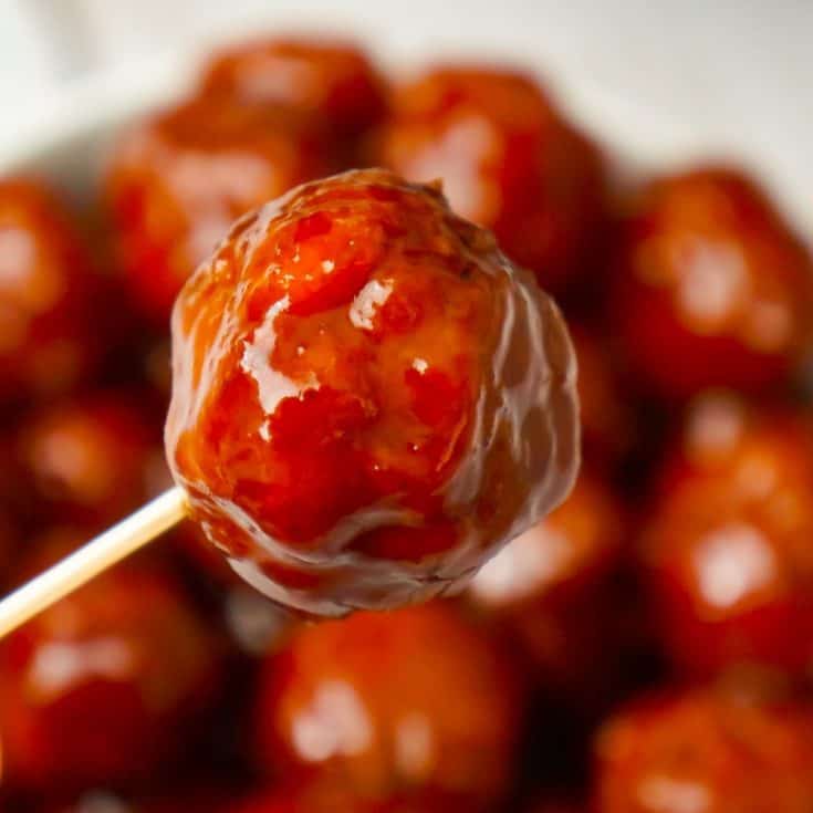 Instant Pot Grape Jelly Meatballs are the perfect party food. These tasty meatballs are coated in Welsh's Grape Jelly and Sweet Baby Ray's Hickory and Brown Sugar BBQ Sauce.