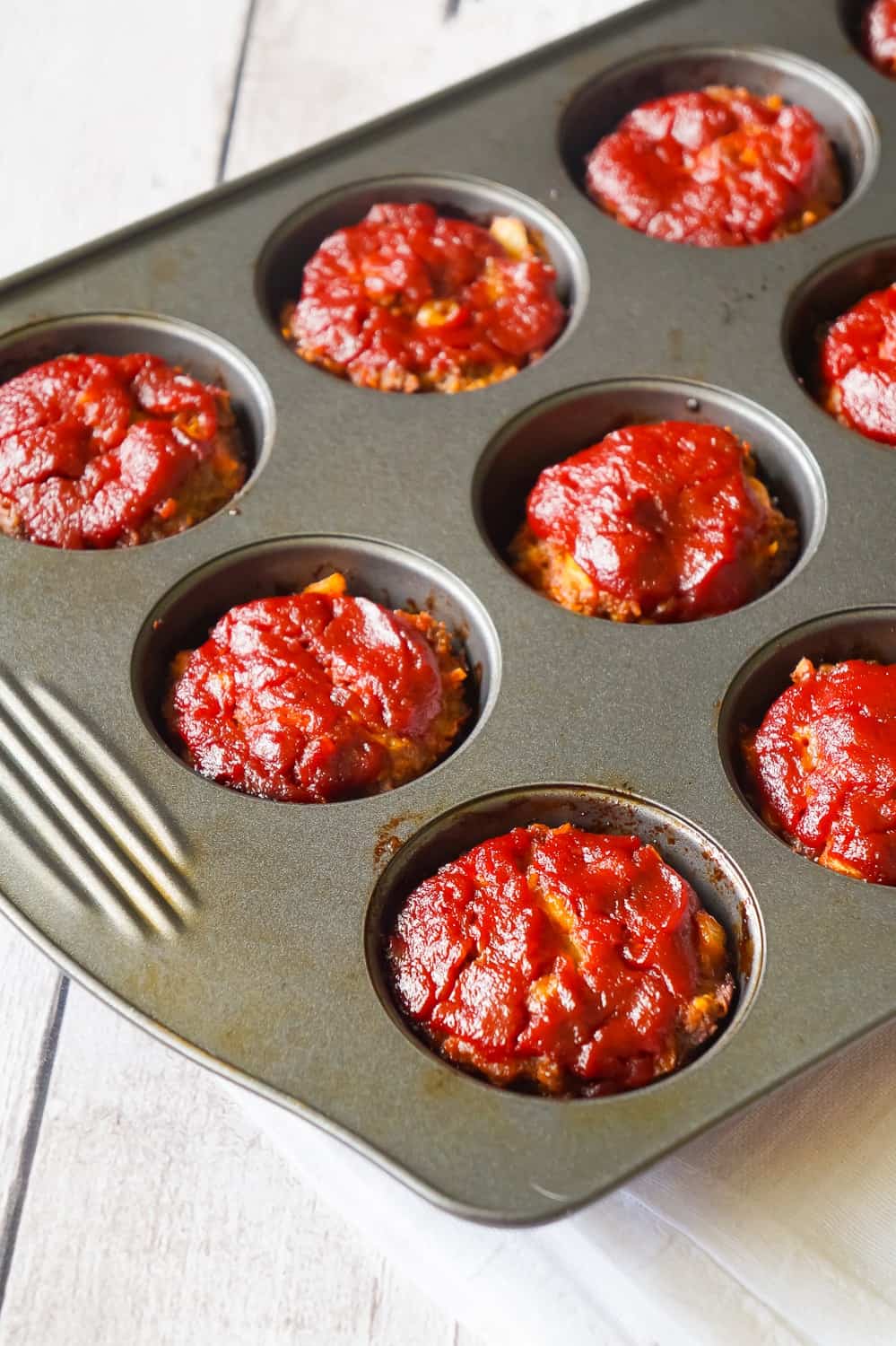 Meatloaf Muffins are a fun alternative to classic meatloaf. These tasty mini meatloaves are made with Lipton Onion Soup Mix and crushed Ritz Crackers.