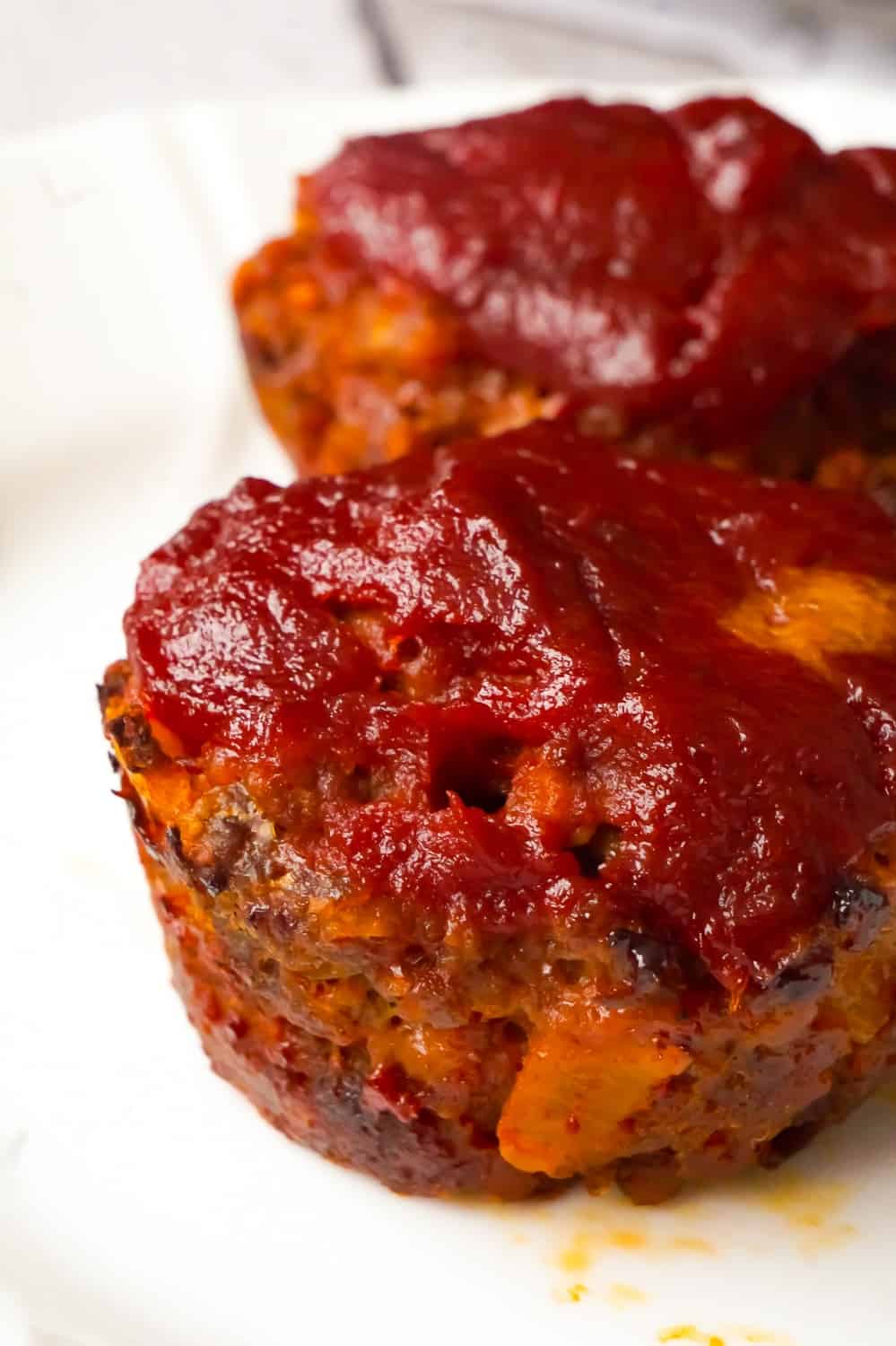 Meatloaf Muffins are a fun alternative to classic meatloaf. These tasty mini meatloaves are made with Lipton Onion Soup Mix and crushed Ritz Crackers.