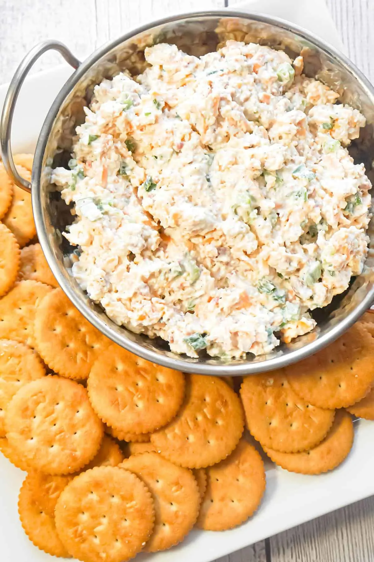 Bacon Cheddar Chicken Salad Dip is a delicious cold dip recipe loaded with mayo, cream cheese, canned chicken, crumbled bacon, chopped green onions and shredded cheddar cheese.