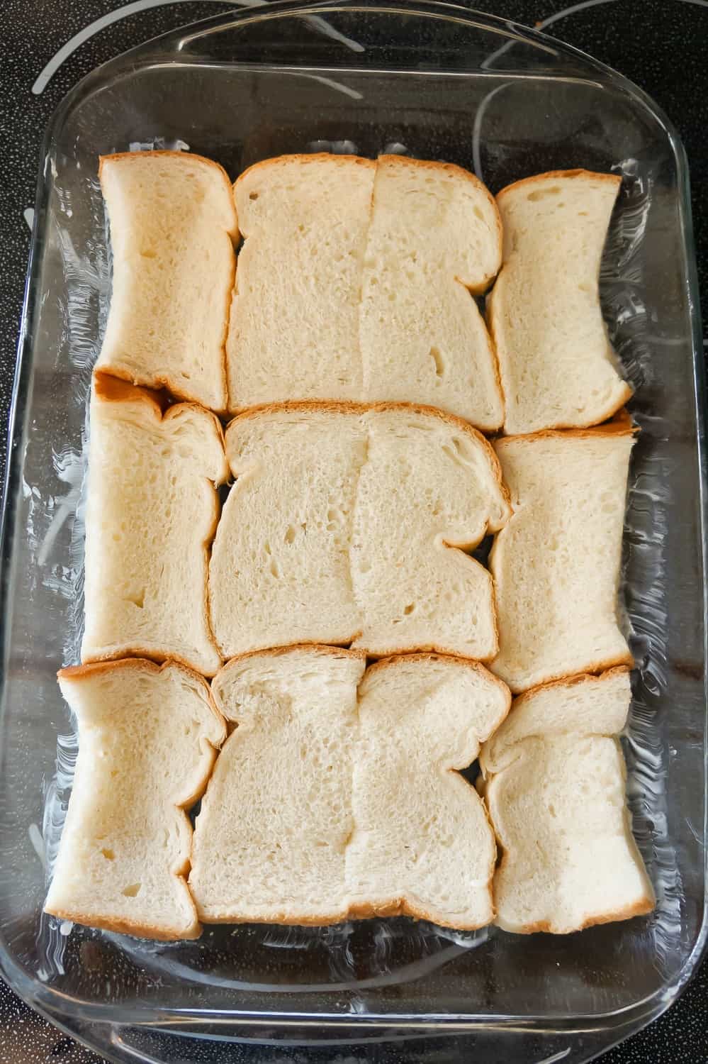 bread slices in a baking dish