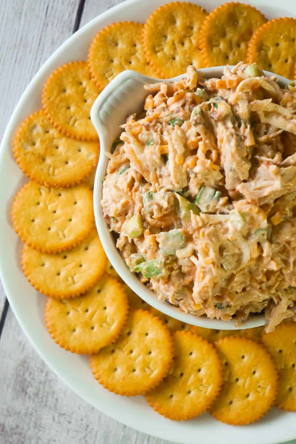BBQ Chicken Dip is a delicious cold party dip recipe perfect for serving with Ritz Crackers. This flavourful dip is loaded with shredded chicken, crumbled bacon, cheese and BBQ sauce.