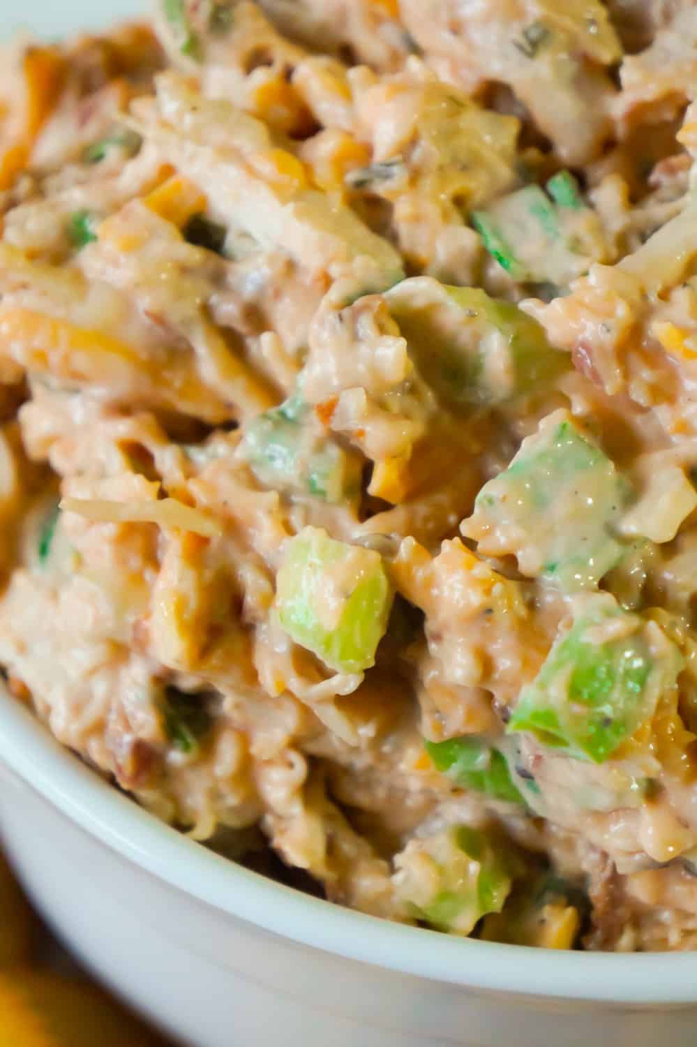BBQ Chicken Dip is a delicious cold party dip recipe perfect for serving with Ritz Crackers. This flavourful dip is loaded with shredded chicken, crumbled bacon, cheese and BBQ sauce.