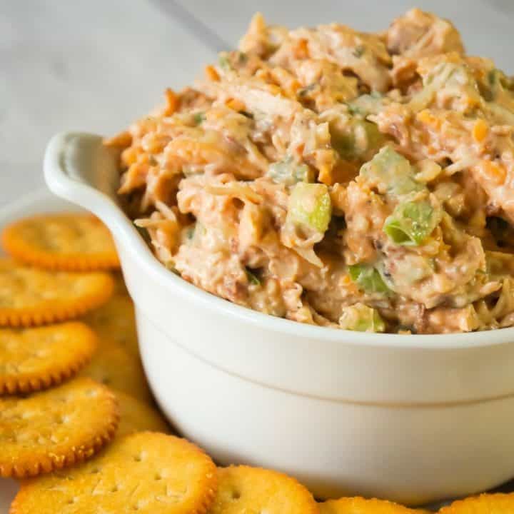 BBQ Chicken Dip is a delicious cold party dip recipe perfect for serving with Ritz Crackers. This flavourful dip is loaded with shredded chicken, crumbled bacon, cheese and BBQ sauce.