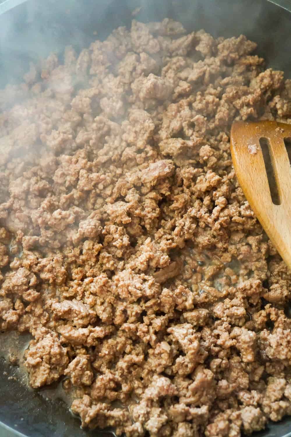 cooked ground beef in a frying pan