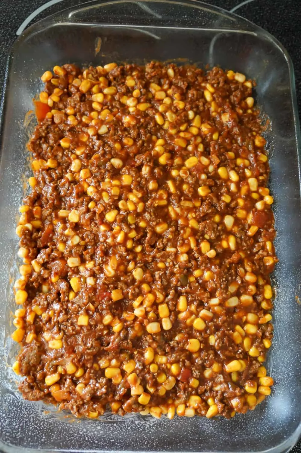ground beef chili mixture in a 9 x 13 inch baking dish