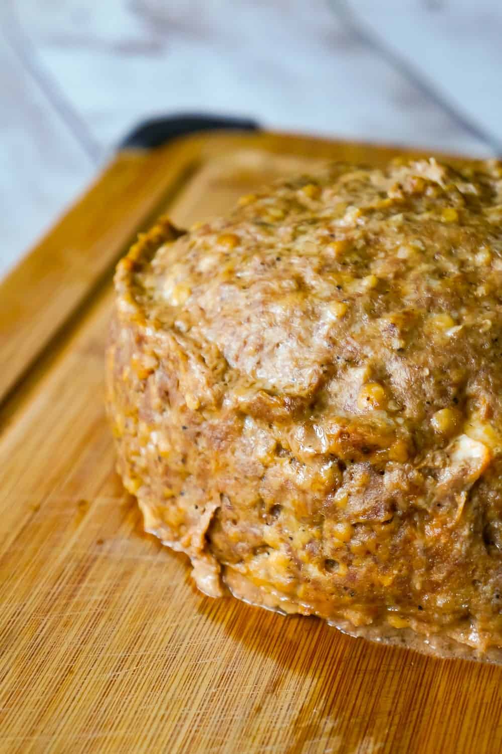 Instant Pot Cream Cheese Stuffed Meatloaf and Mashed Potatoes is an easy dinner recipe all cooked together in the Instant Pot. This delicious meatloaf is stuffed with Philadelphia Chive Whipped Cream Cheese and Sweet Baby Ray's BBQ Sauce.