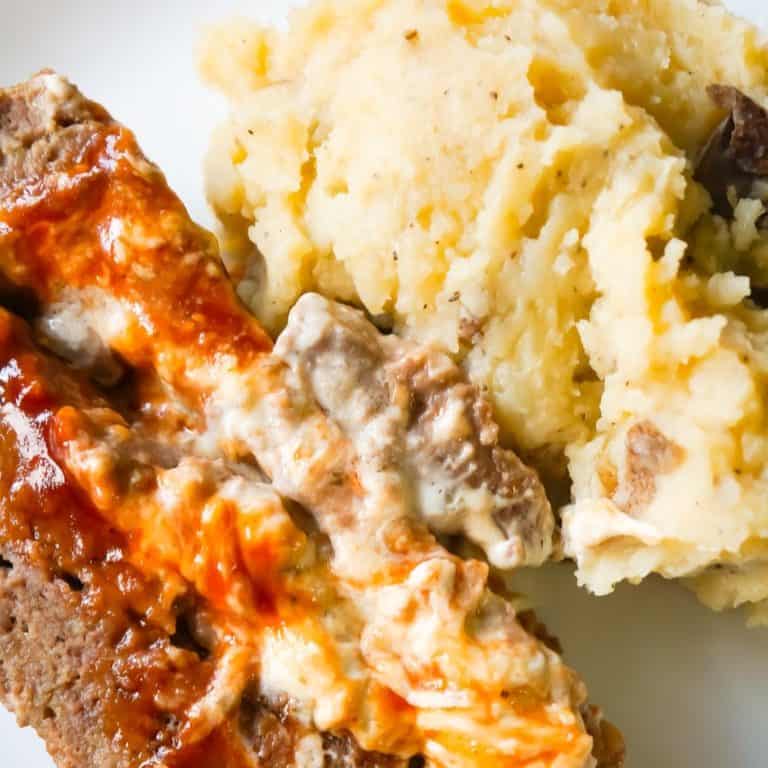 Instant Pot Cream Cheese Stuffed Meatloaf and Mashed Potatoes is an easy dinner recipe all cooked together in the Instant Pot. This delicious meatloaf is stuffed with Philadelphia Chive Whipped Cream Cheese and Sweet Baby Ray's BBQ Sauce.