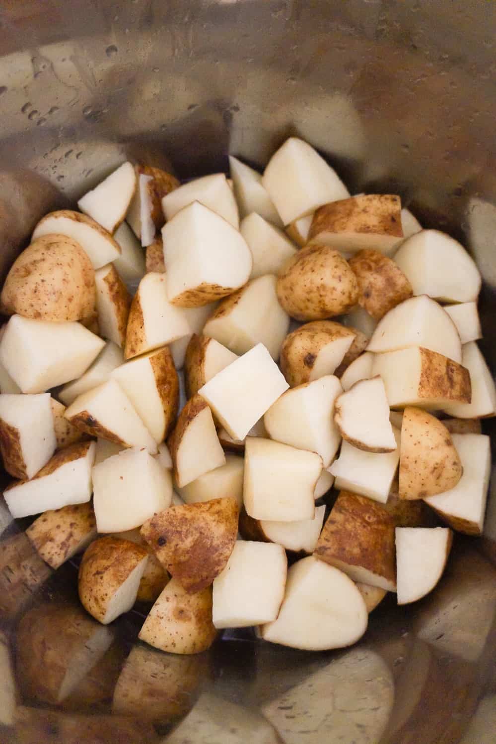 raw potato chunks in an Instant Pot