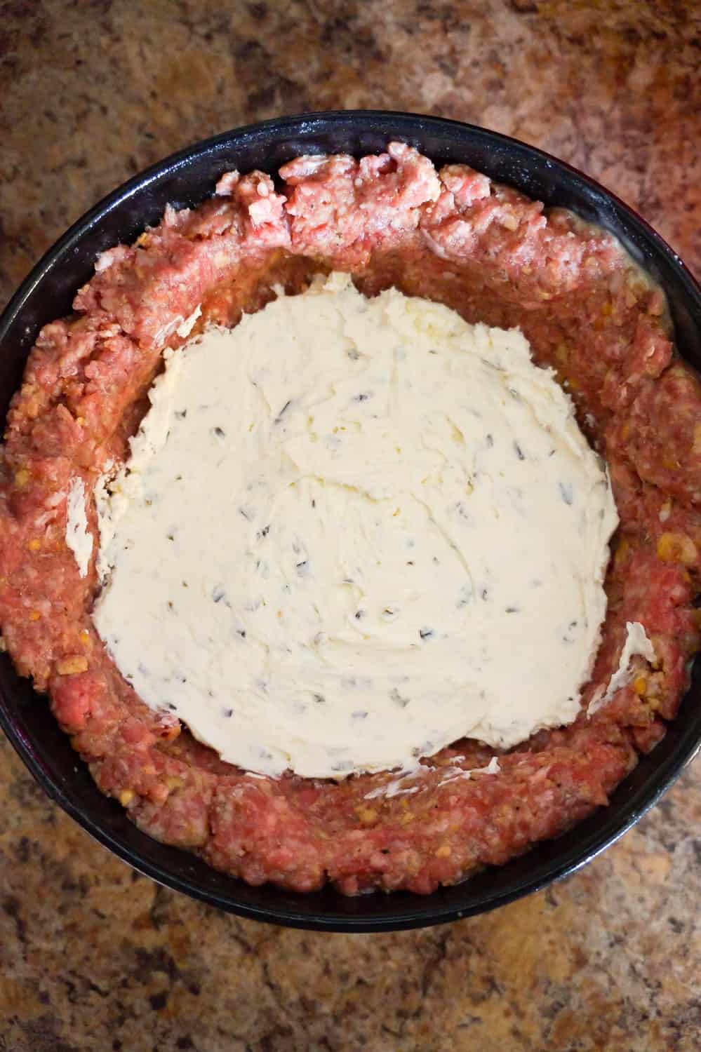 cream cheese inside of raw meatloaf
