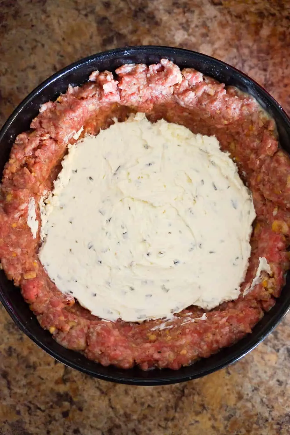 cream cheese inside of raw meatloaf