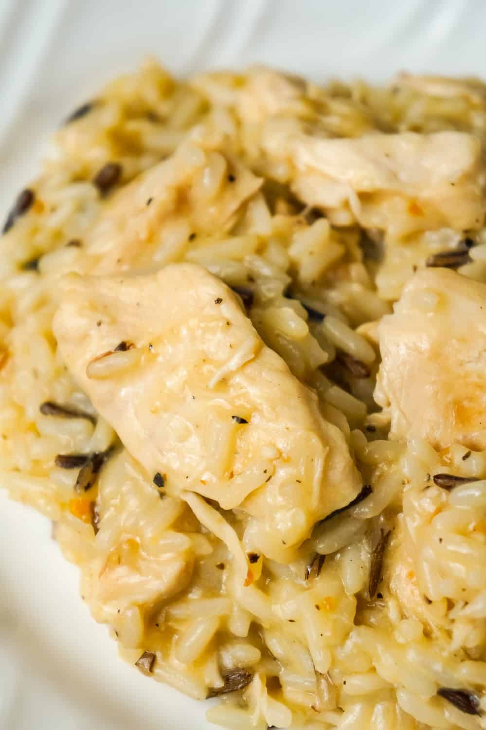 Instant Pot Lemon Pepper Chicken and Rice is an easy and delicious chicken dinner recipe. This creamy long grain and wild rice dish is loaded with tender chicken breast chunks.