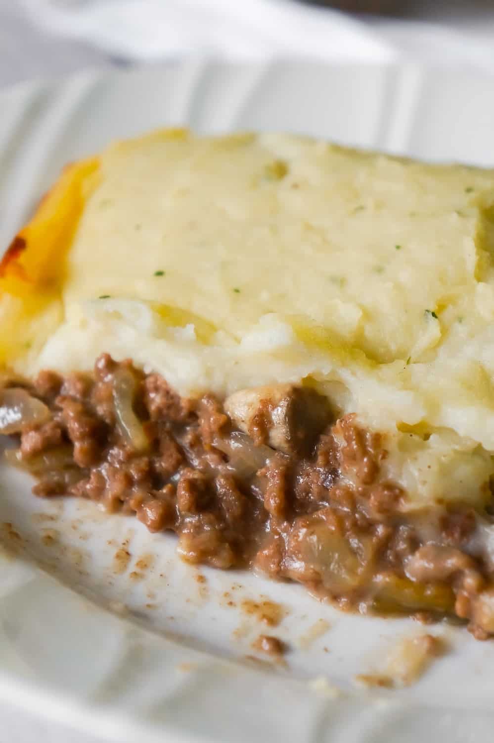 Salisbury Steak Casserole is an easy ground beef dinner recipe perfect for weeknights. This hearty casserole is loaded with ground beef, mushroom and onions in a creamy mushroom gravy and topped with instant mashed potatoes.