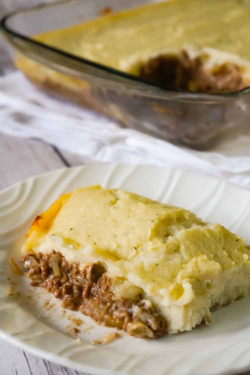 Salisbury Steak Casserole is an easy ground beef dinner recipe perfect for weeknights. This hearty casserole is loaded with ground beef, mushroom and onions in a creamy mushroom gravy and topped with instant mashed potatoes.