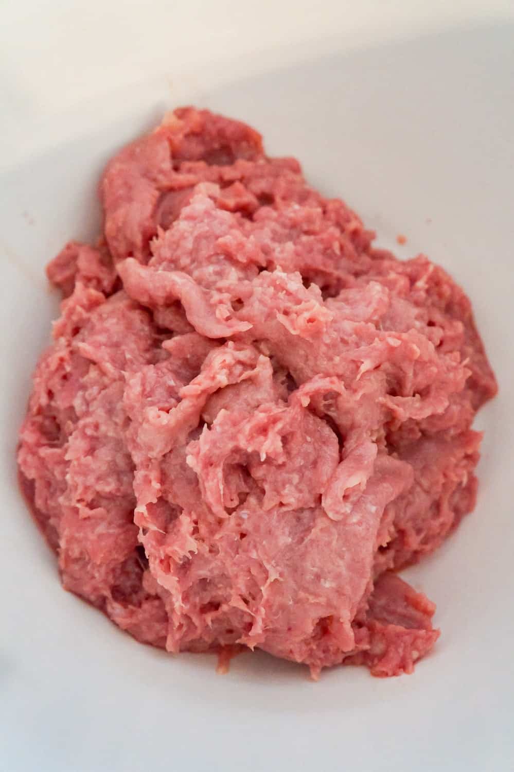 ground turkey in a mixing bowl