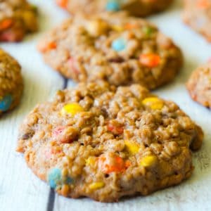 Chocolate Monster Cookies are an easy peanut butter dessert recipe using quick oats and mini M&M's. These chewy peanut butter cookies with cocoa powder are a delicious twist on the classic Monster Cookie.